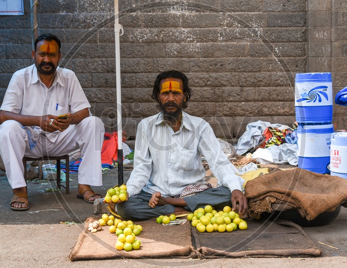 Vendor in Pune selling Lemons