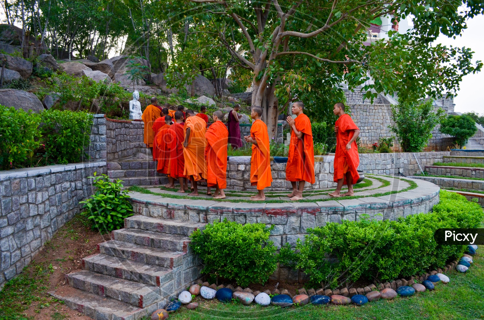 Monks offering prayers to Buddha