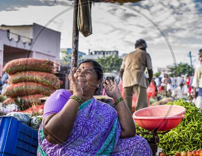 Happy Female Vendor at Gudimalkapur Flower Market