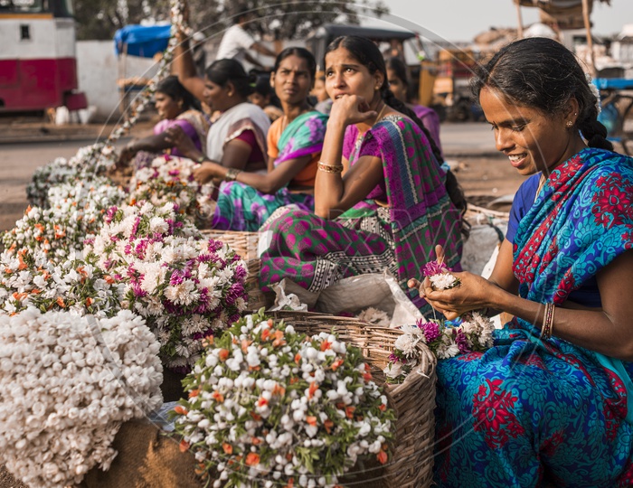 Happy Female Flower Vendors at Gudimalkapur Flower Market