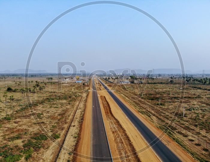 Aerial view of 8 Line access roads being built in Amaravati