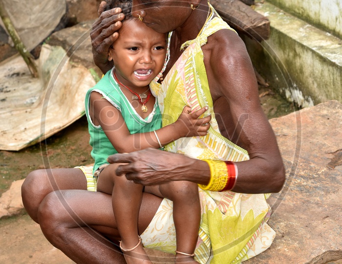 Tribal Woman, Child Crying