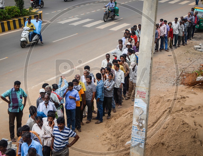 People stand in Queue at Anna canteen