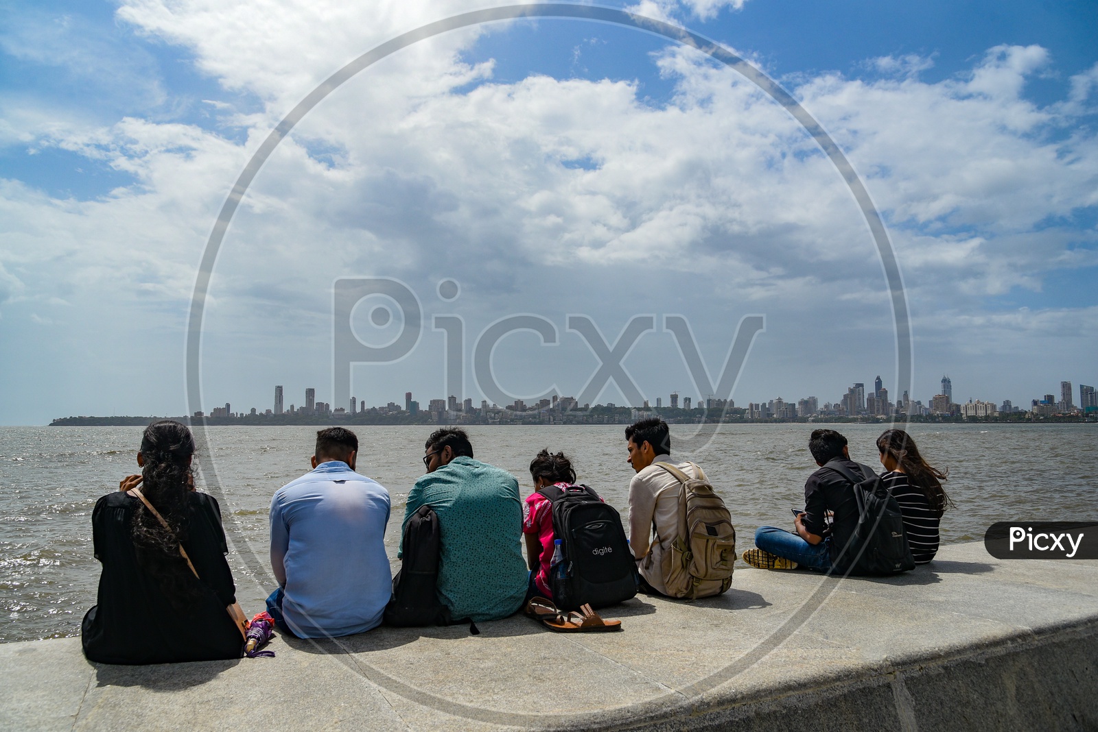 Students enjoying the view at Marine Drive in Mumbai