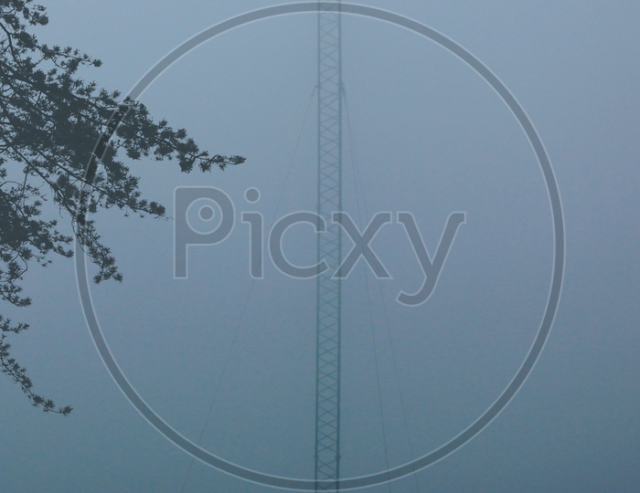 Tower in foggy clouds