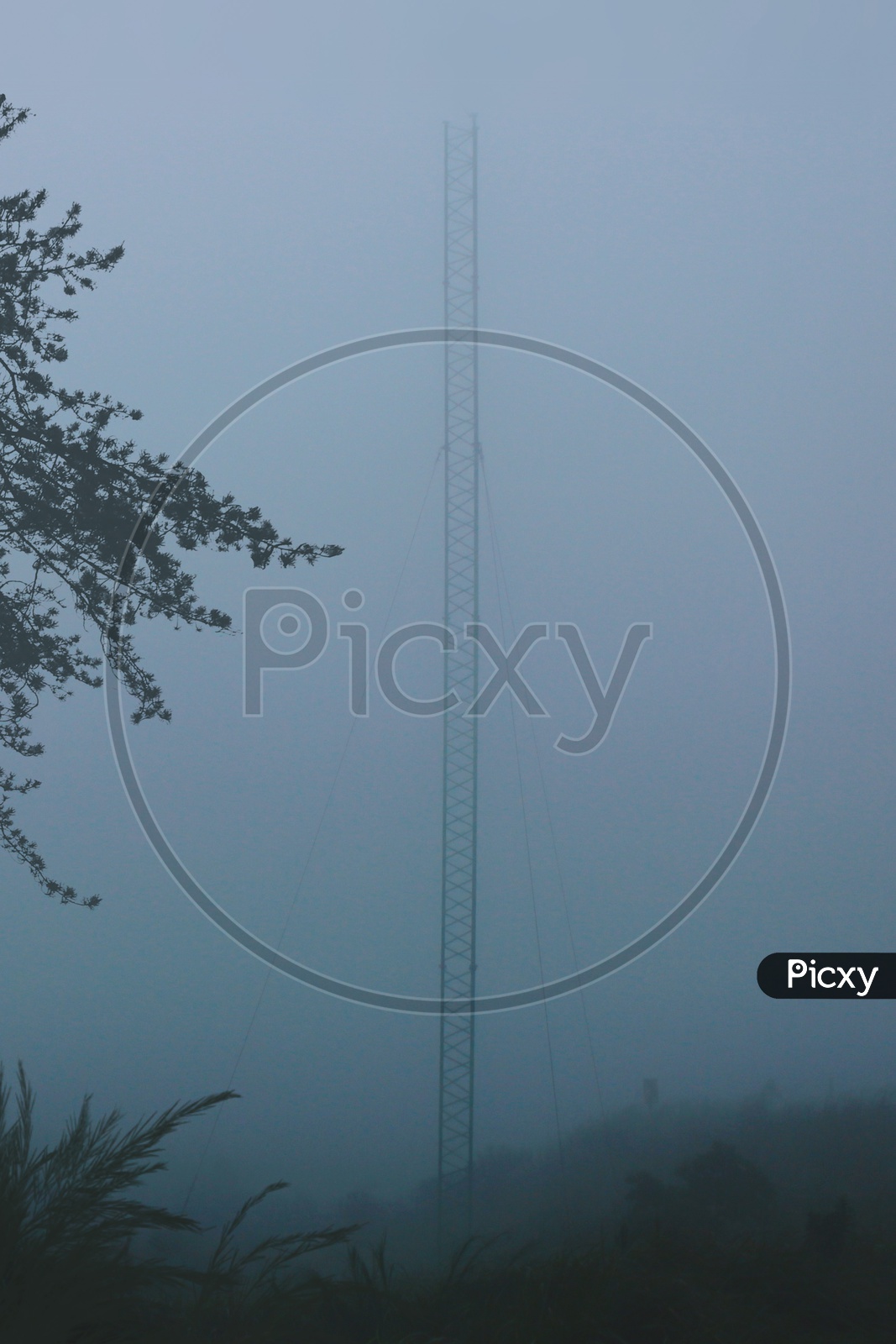 Tower in foggy clouds