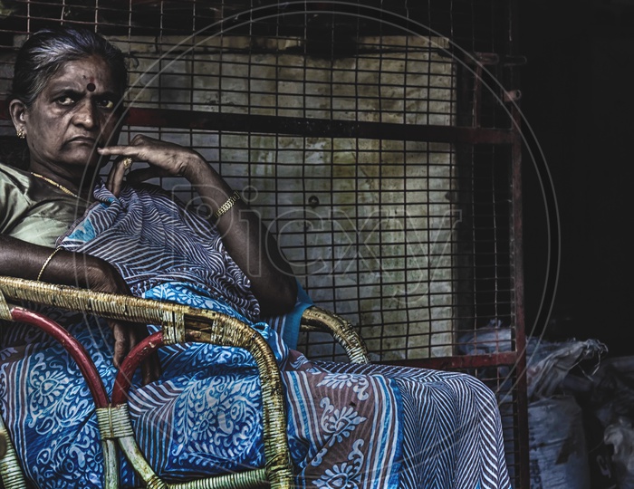 A lady worker of a pottery shop in bangalore