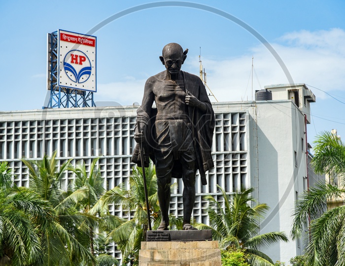 Mahatma Gandhi Statue with Hindustan Petroleum (HP) Building in the bacground