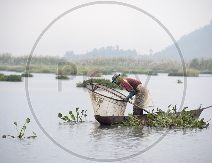 Fisherman in Loktak Lake, Manipur