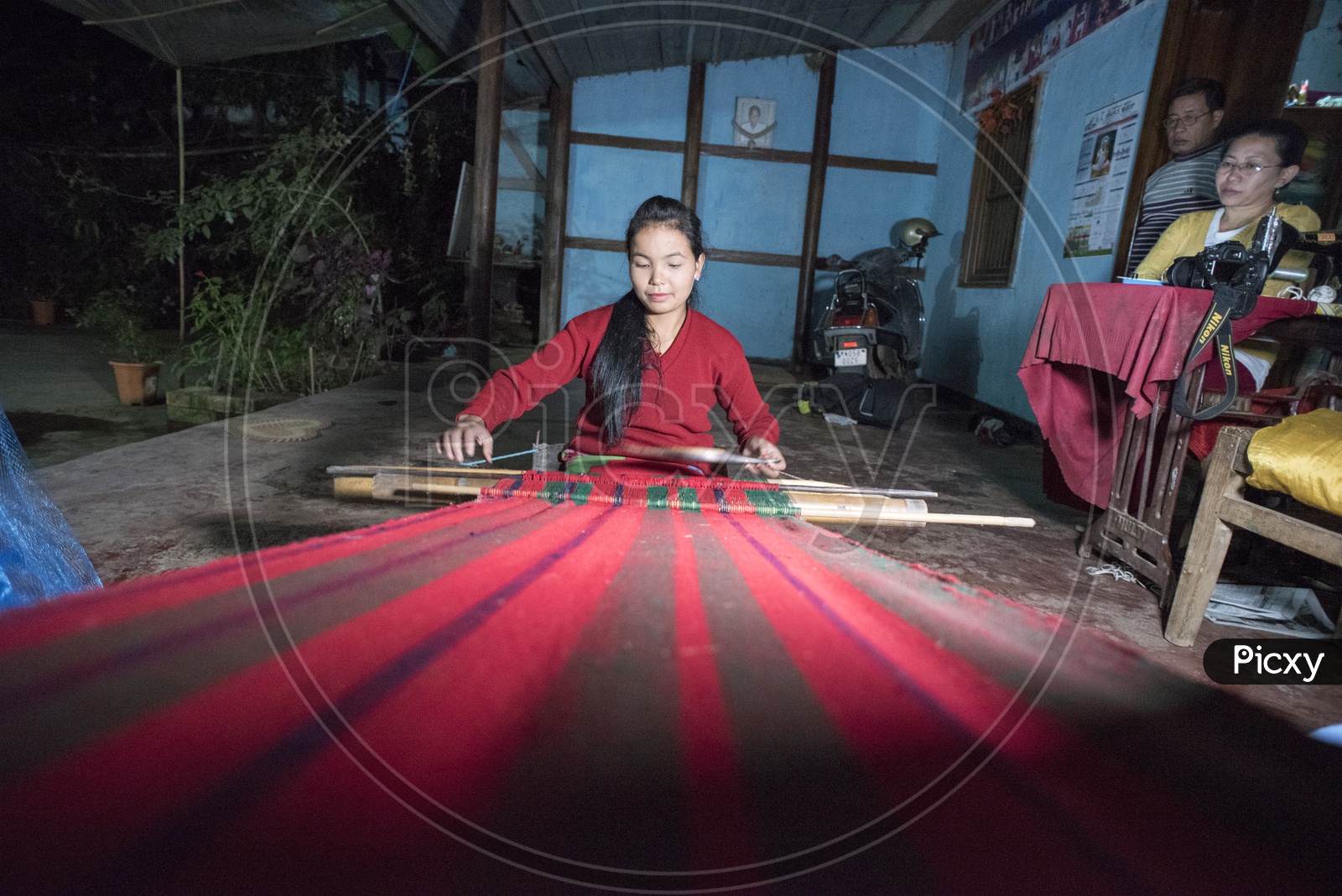 Girl Weaving a Saree near Loktak Lake, Manipur