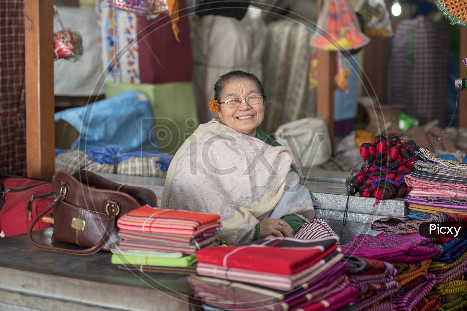 Female vendor Smiling, Ema Market