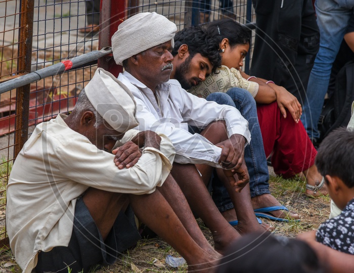 Tired and sleepy patients waiting for Fish Prasadam at Nampally Exhibition Grounds