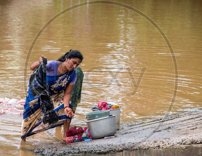 Villagers using river water for washing clothes