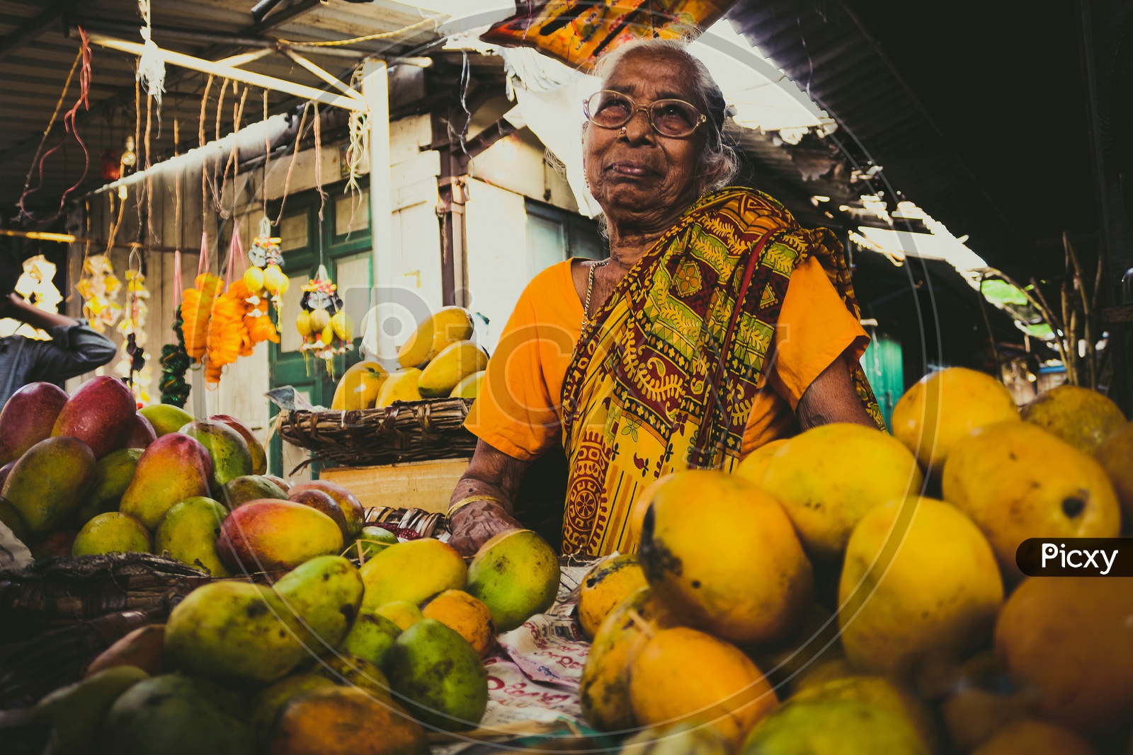 A vendor at poorna market