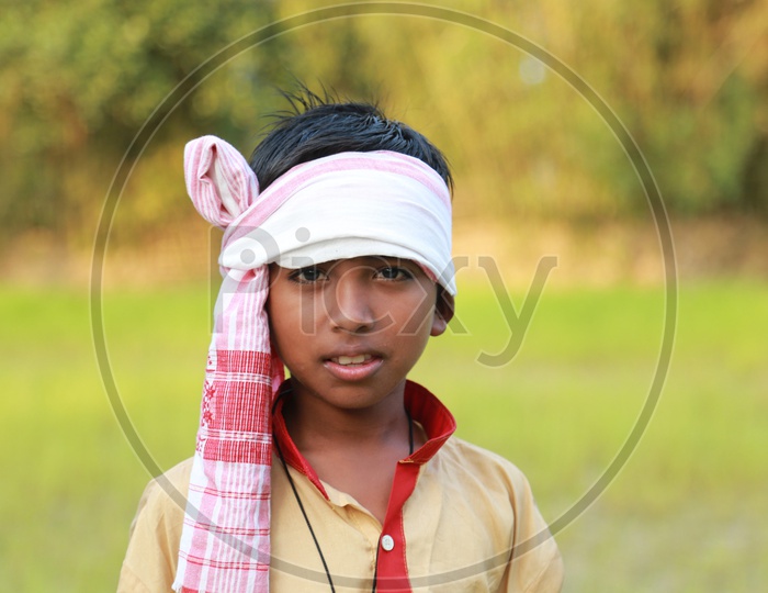 A boy in Bihu attire.