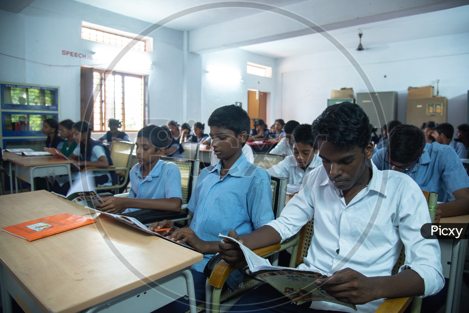 Students in a Government School Library