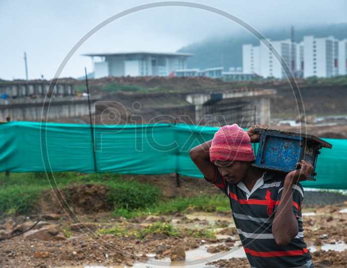 A worker at Amaravati Waterways Construction site near SRM University