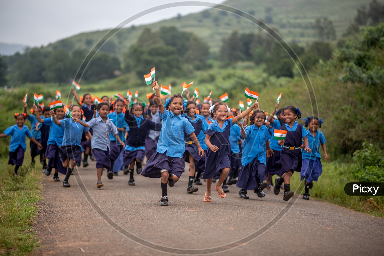 Kids running with indian flags