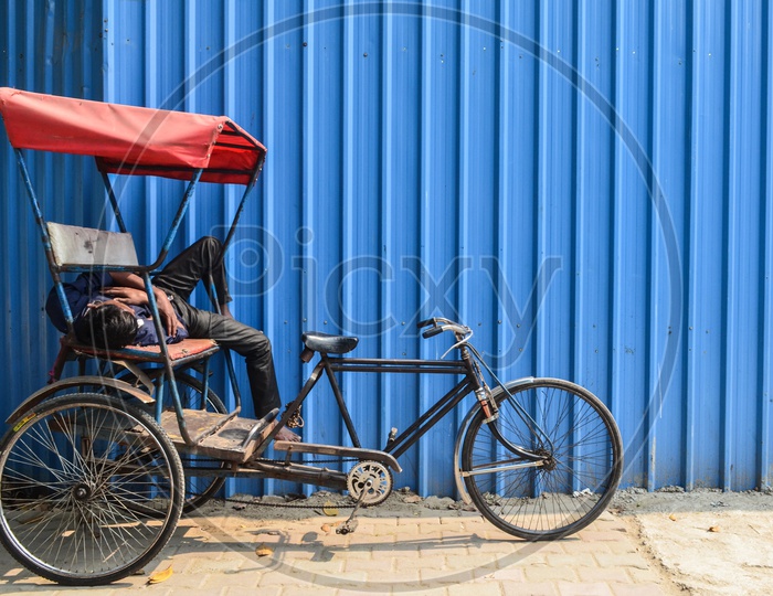 TRICYCLE WALA AT REST