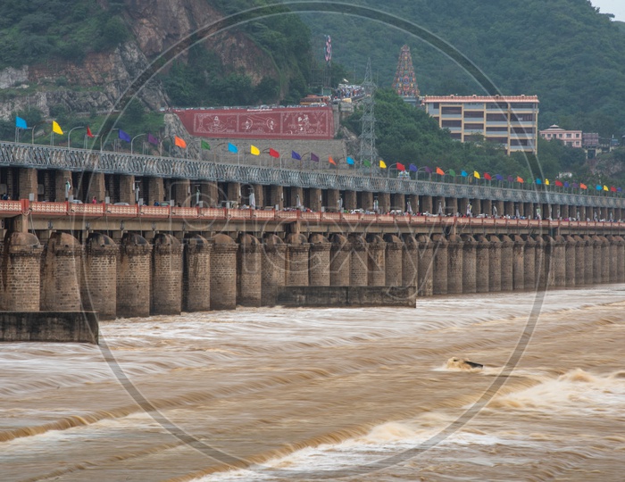 Prakasam Barrage after the gates are lifted off to release the surplus water into the sea