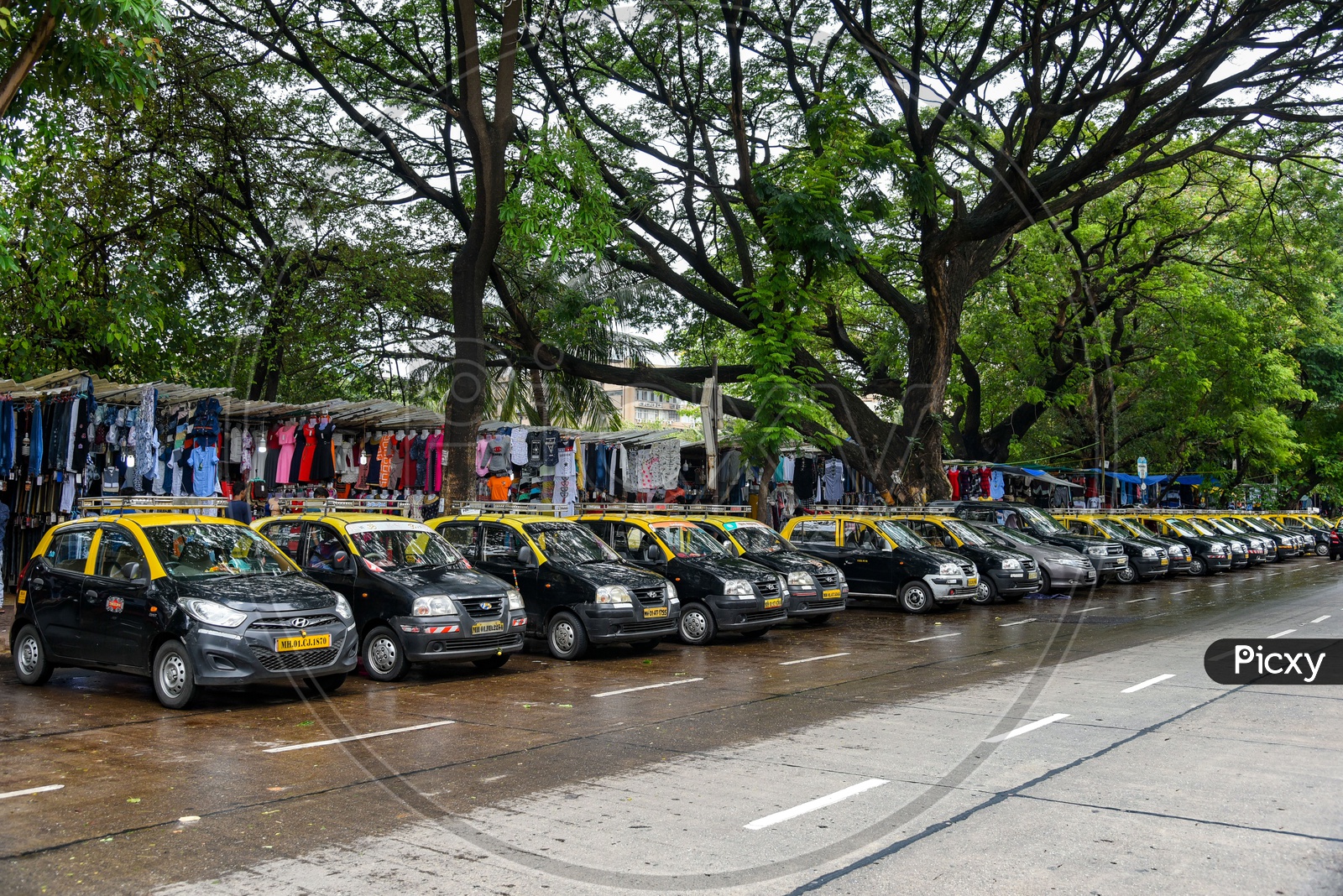 Taxis parked on a street in Mumbai