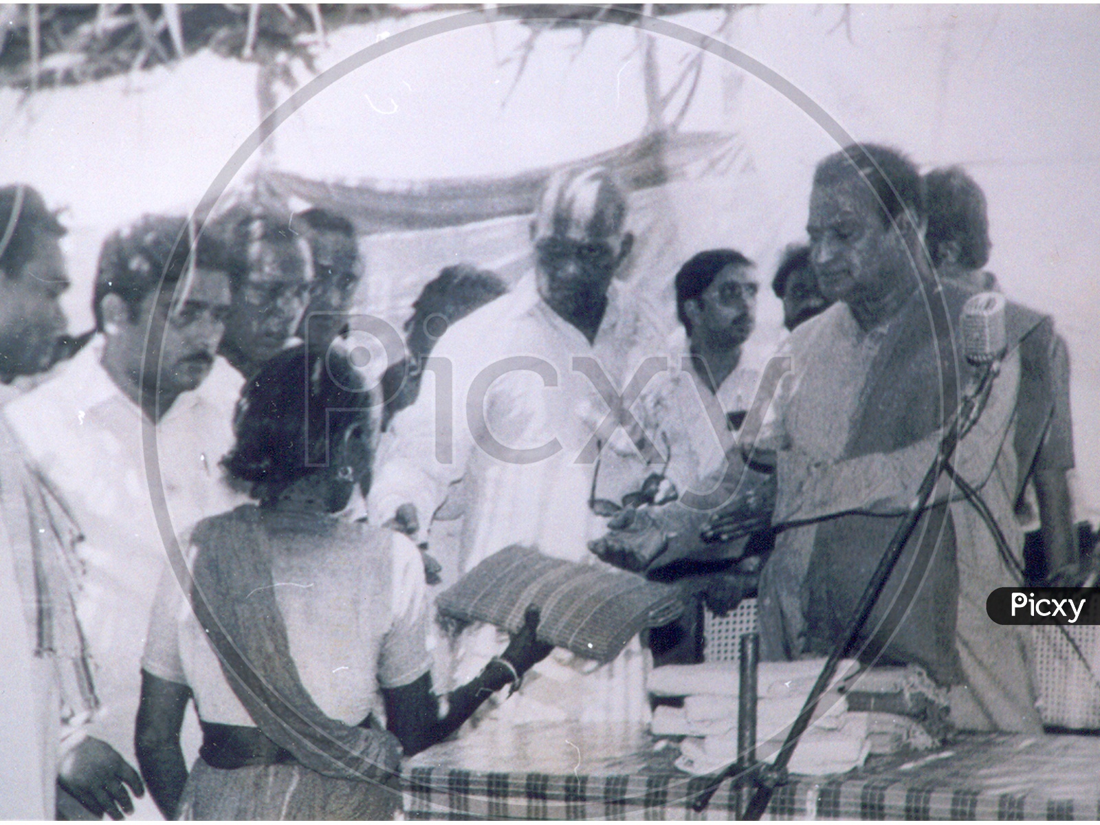 N T Rama Rao ( NTR) distributing clothes to women