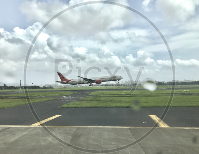 Air India Flight taking off from Runway