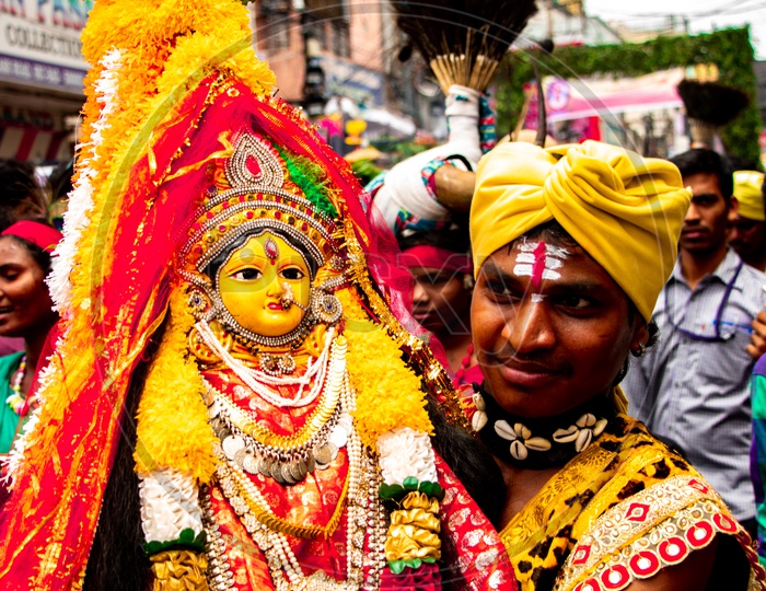Tribal Goddess Being Carried By The Tribal People At Ujjaini Mahankali Bonalu I