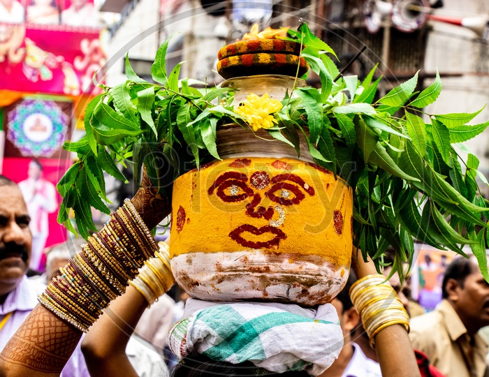 Woman Carrying Bonam Or Bonalu on Head During Ujjaini Mahankali Bonalu