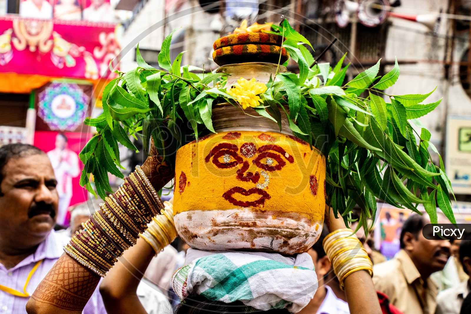 Woman Carrying Bonam Or Bonalu on Head During Ujjaini Mahankali Bonalu