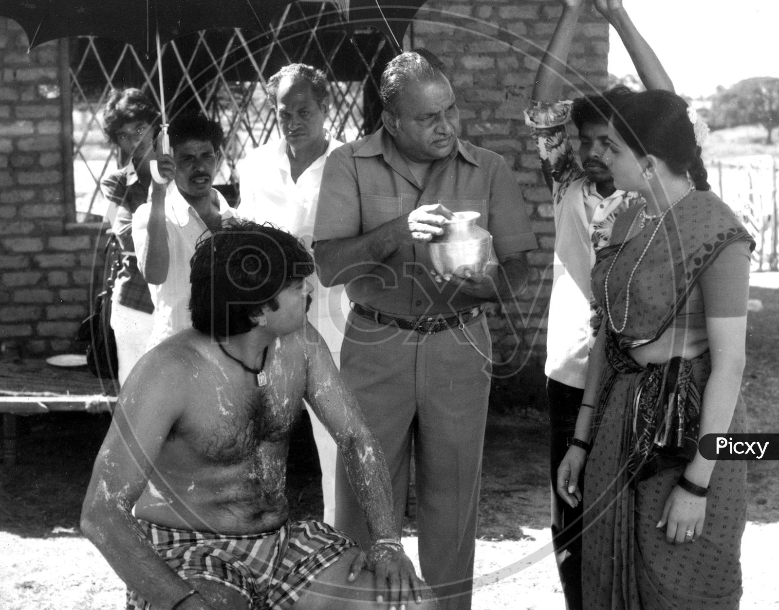 Chiranjeevi and Vijayashanti from Swayamkrushi movie. Legendary Director K Vishwanath garu can also be seen explaining the scene. Chiranjeevi Old Movie Stills