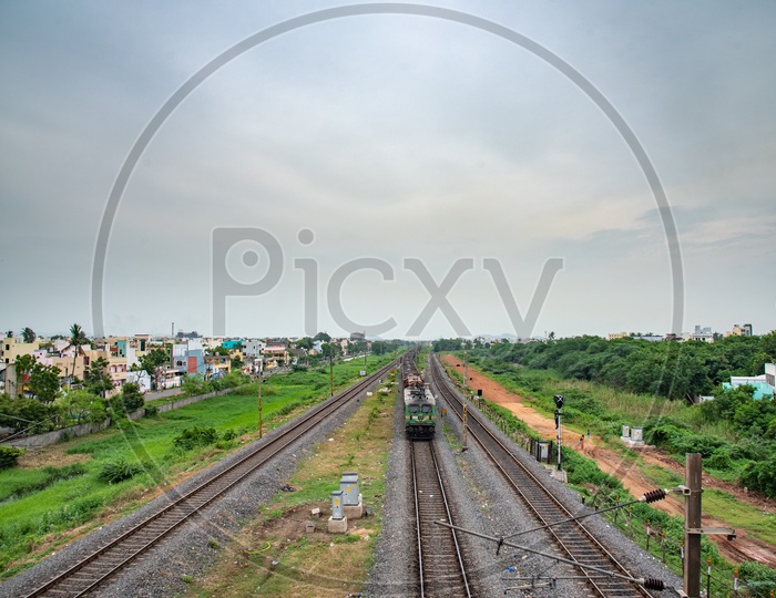 a train approachin budameru bridge on Eluru-Vijayawada CHannel