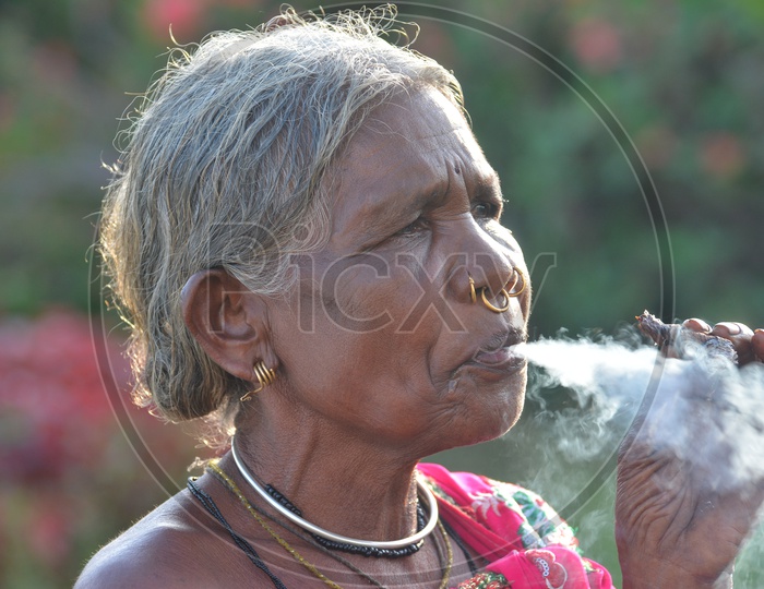 Tribal Woman Smoking
