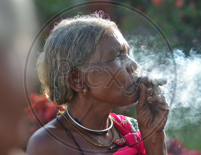 Tribal Woman Smoking