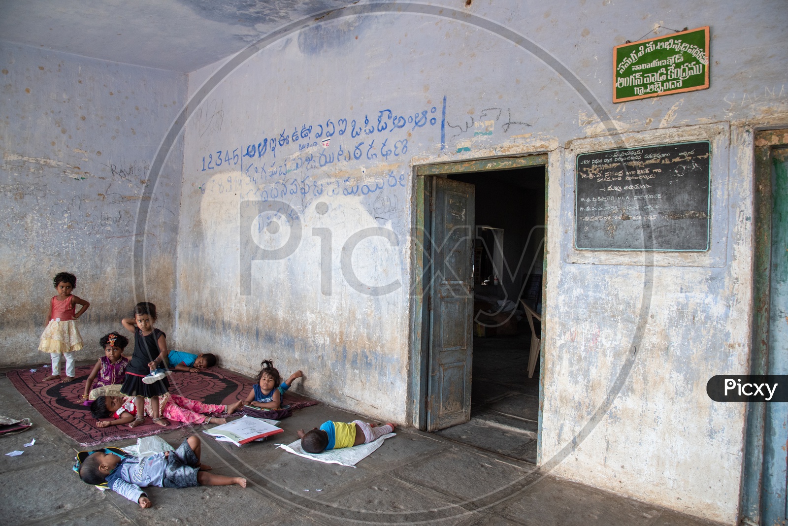 students/kids/children in an Anganwadi School,Abbenda during their Nap time