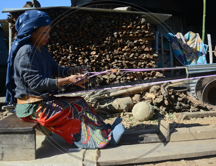 Woman weaving a shawl in Nagaland