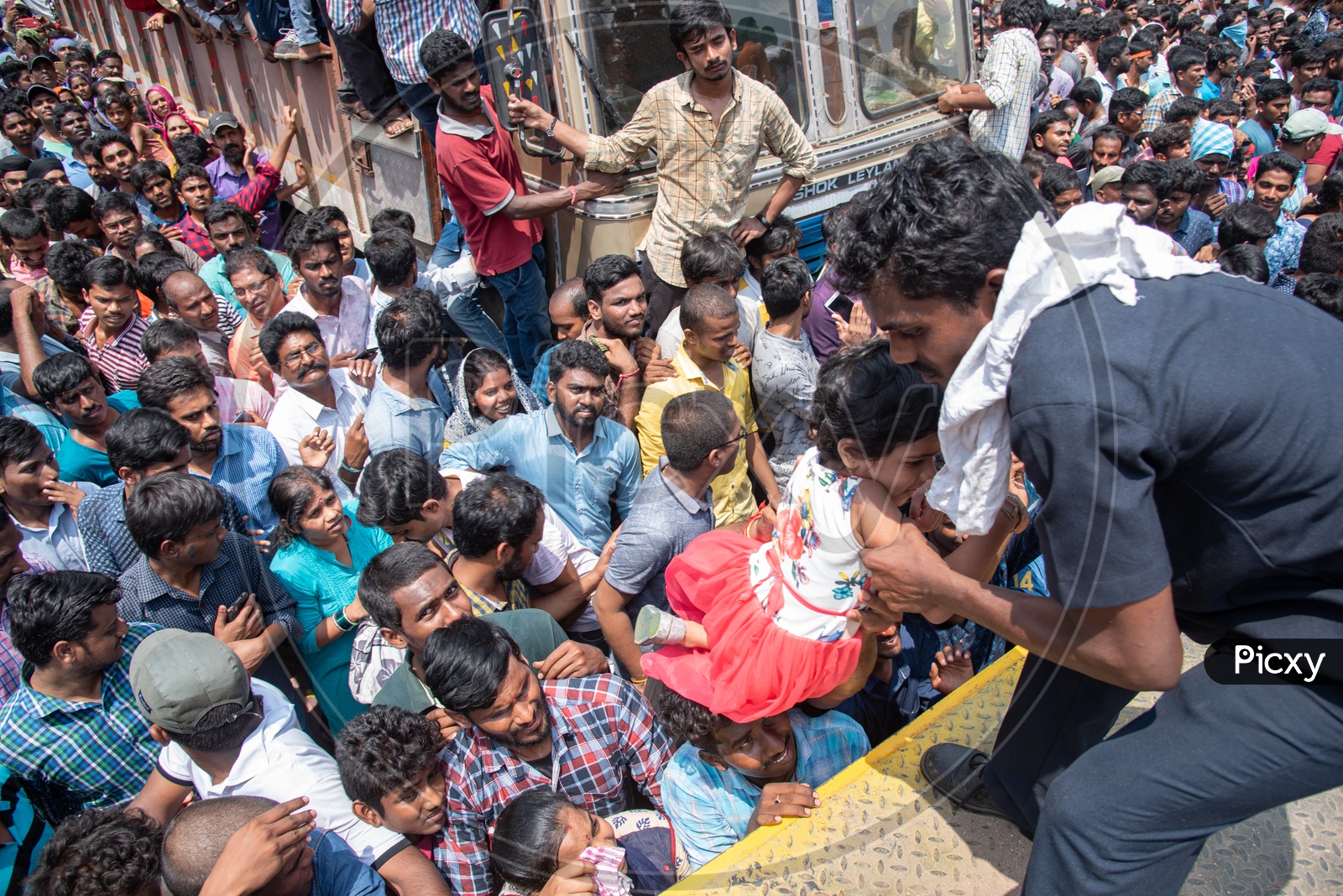 GHMC and Police help kids to sit at a safer place during the Khairatabad ganesh procession