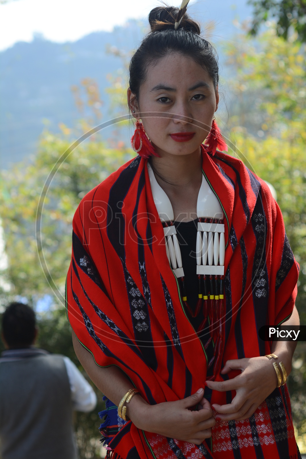 Naga Tribesmen And A Naga Women Dressed In Traditional Attire With  Traditional Weapons At Kohima Nagaland India On 1 December 2016 Stock  Photo, Picture and Royalty Free Image. Image 177929979.