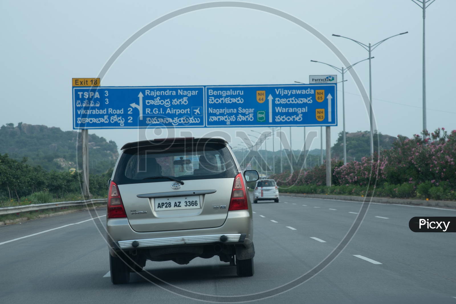 Distance and exit Sign boards on Nehru Outer Ring Road, Hyderabad