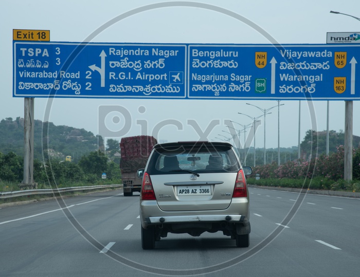 Distance sign boards on Nehru Outer Ring Road, Hyderabad