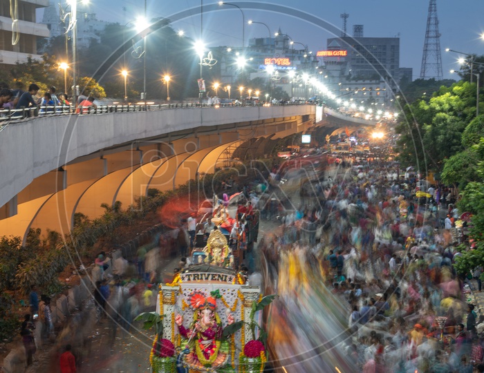 Ganesh Idol Procession beside Telugu Thalli Fly Over