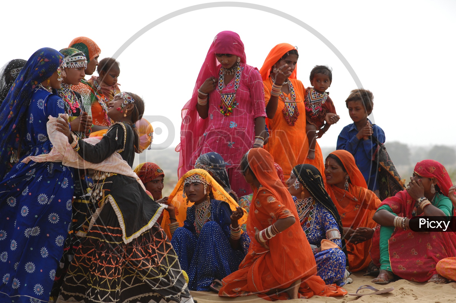 Indian women and kids in desert Rajasthan
