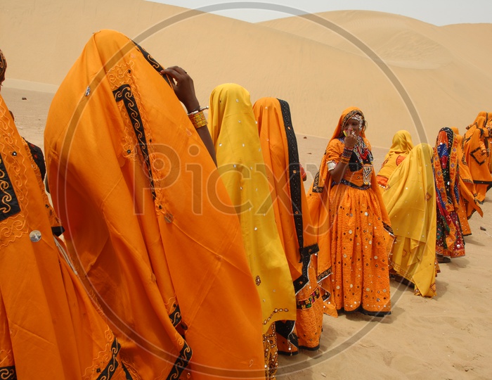 Rajasthani women in Desert Sand dunes
