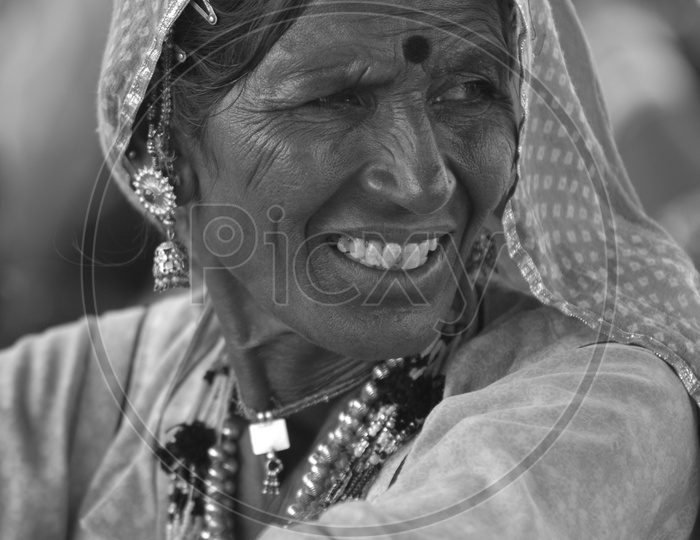 Indian woman in Rajasthani dressing attire