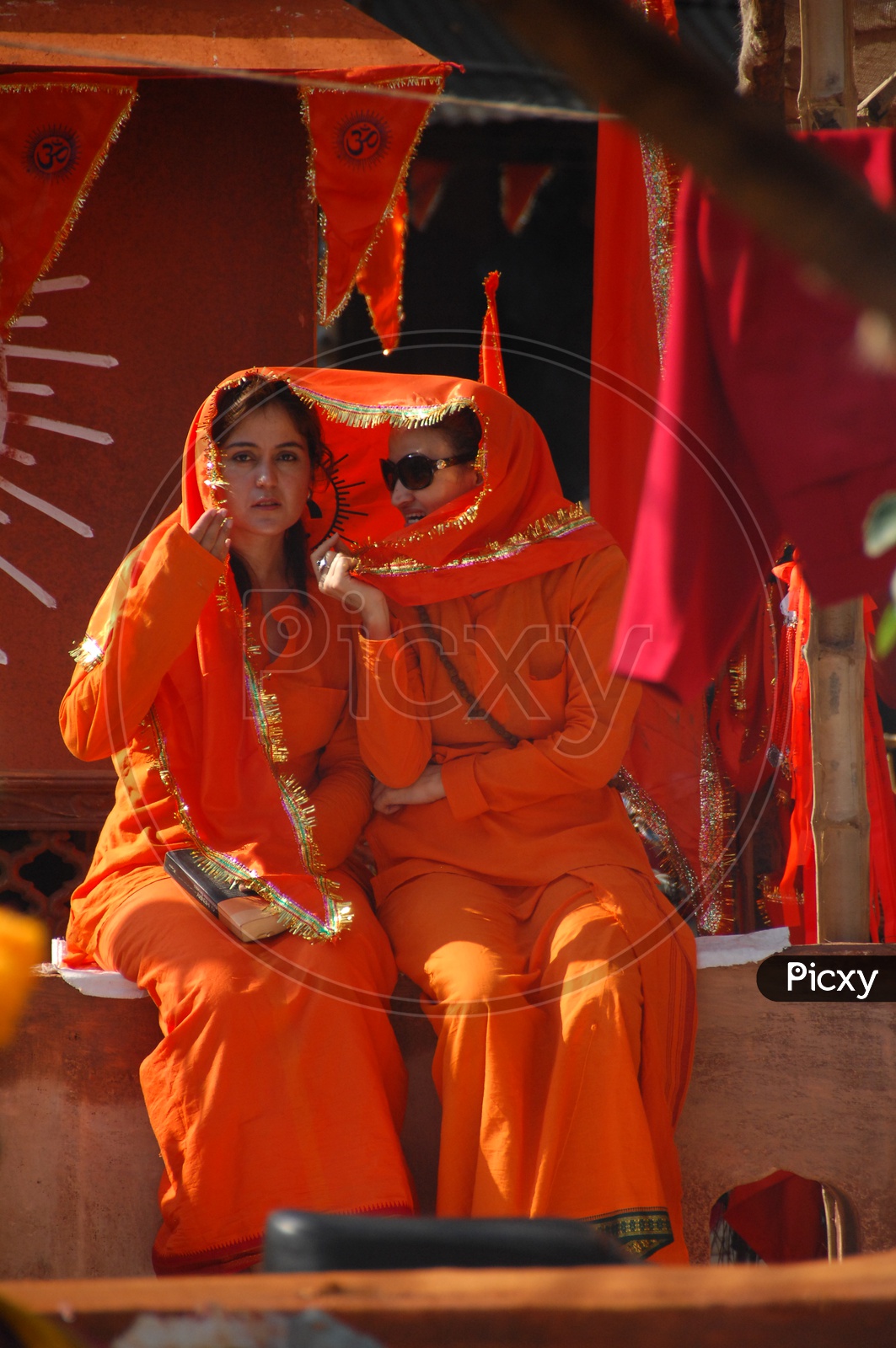 Foreign Woman In Saffron Clothes In India
