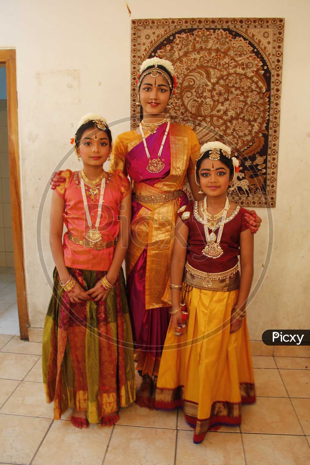 Indian Girls In a Traditional Attire For Performing Classical Dance