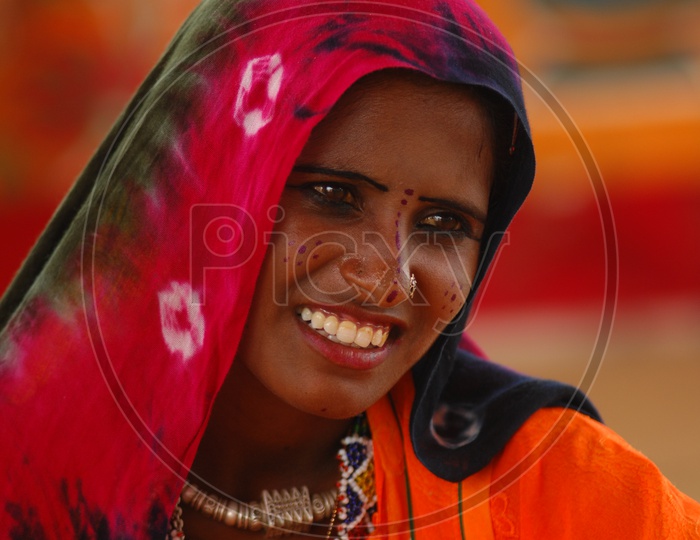 Image of Indian woman in rajasthani dressing attire-KO921680-Picxy