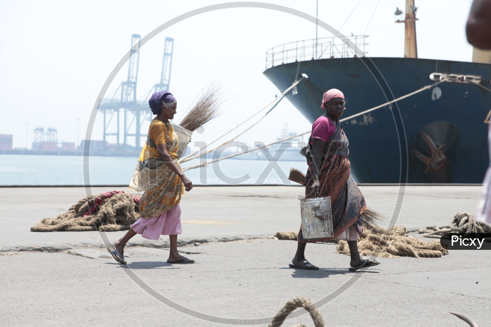 Women cleaners in a shipyard