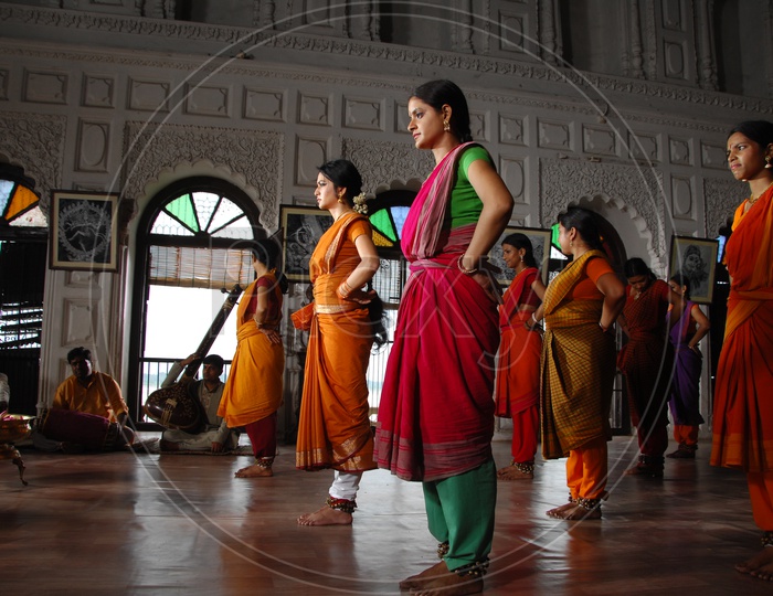 Indian Female  dancers  wearing Traditional Sarees in Movie Shooting