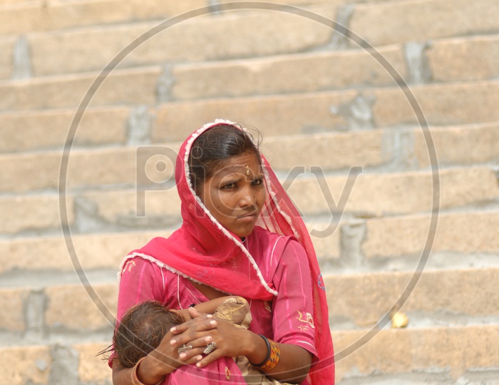 Indian Rajasthani  Mother Feeding her Child
